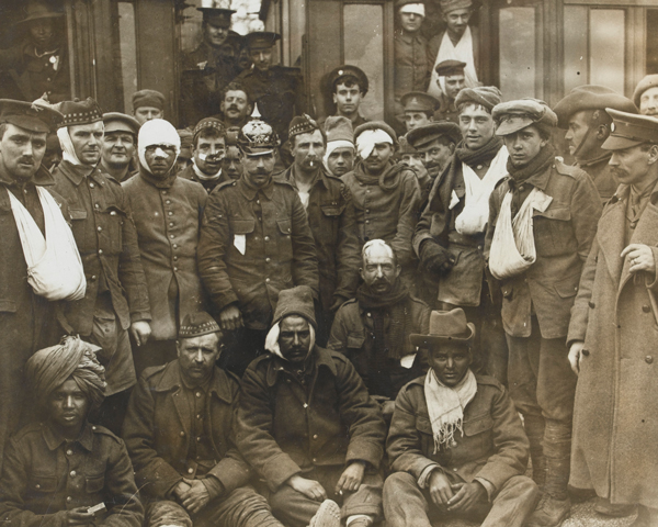 Wounded British, French and Indian soldiers at Neuve Chapelle, 1915.