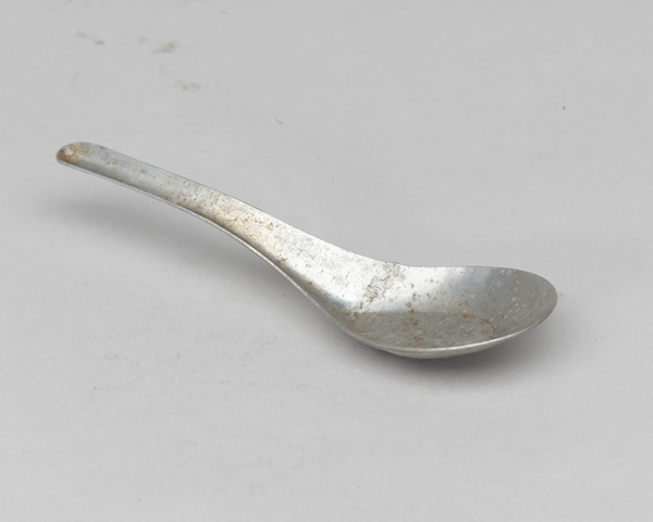 Metal spoon used by Private James Wood of The Gloucestershire Regiment, while a POW