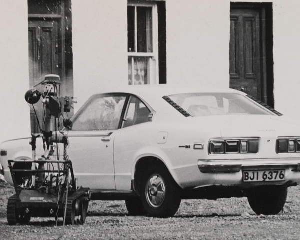 A Wheelbarrow robotic device approaches a suspected car bomb, Omagh, 1975