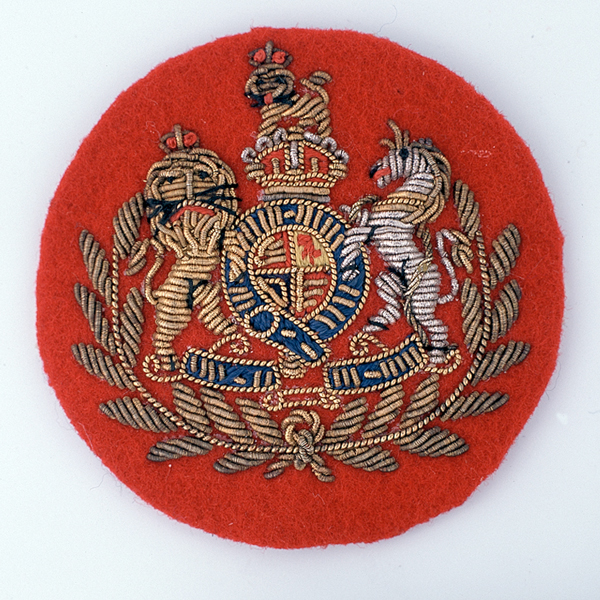 John Lennon wore a Warrant Officer's 1st Class patch similar to this one on his costume