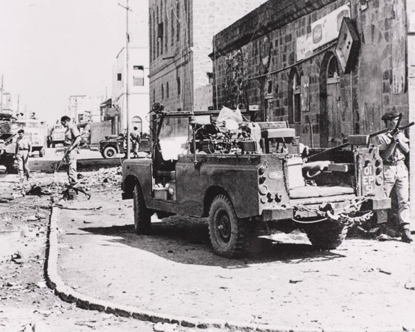 British soldiers patrol the streets of Aden, 1966