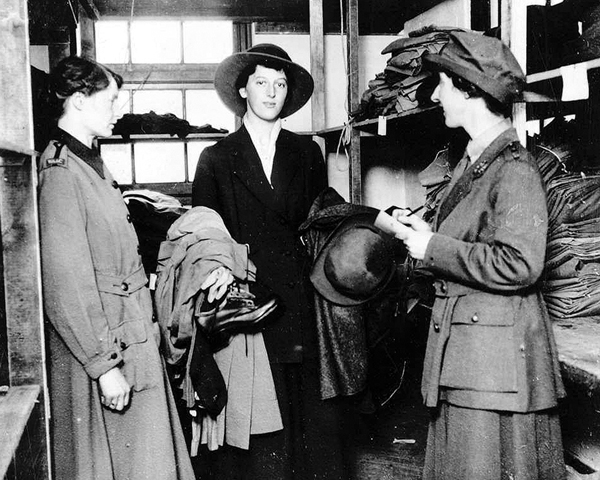 A WAAC recruit collects her uniform, 1917