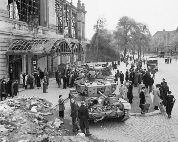 German civilians gather around British tanks in occupied Hamburg, 5 May 1945