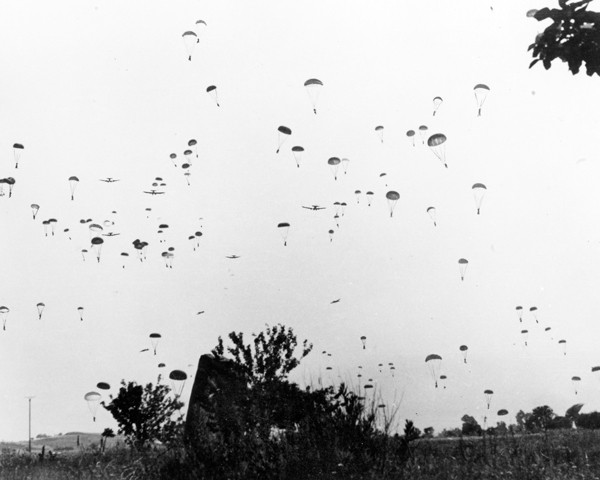 German paratroops and their equipment descend from transport aircraft, Crete, 20 May 1941