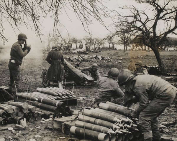 105mm field guns firing at German positions on the 3rd US Army front, 1944