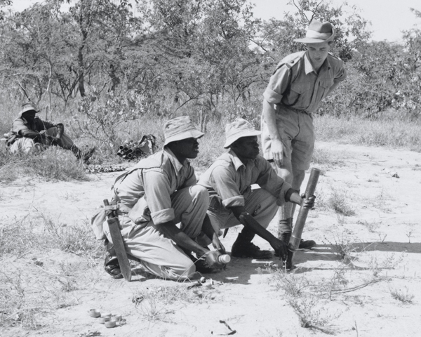 Training with a light mortar in the Kenyan bush, 1956