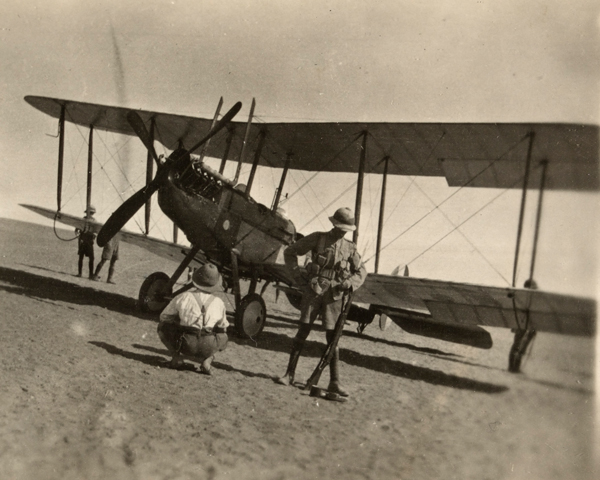 British soldiers inspect a BE2c biplane on the Palestine front, c1918