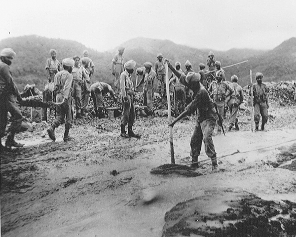 Bengal Sappers and Miners repairing the Palel-Tamu Road, Imphal, 1944 