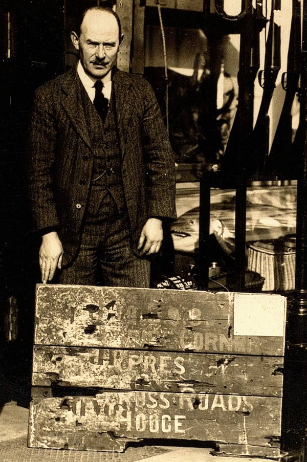 William Storie with the Hellfire Corner sign, c1920s