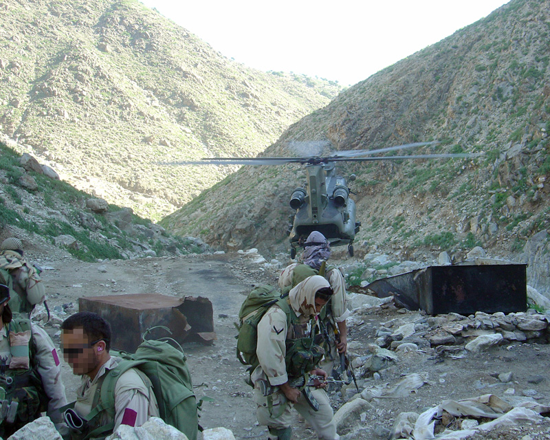 SAS troop having been dropped by helicopter into an Afghan valley, c2006 