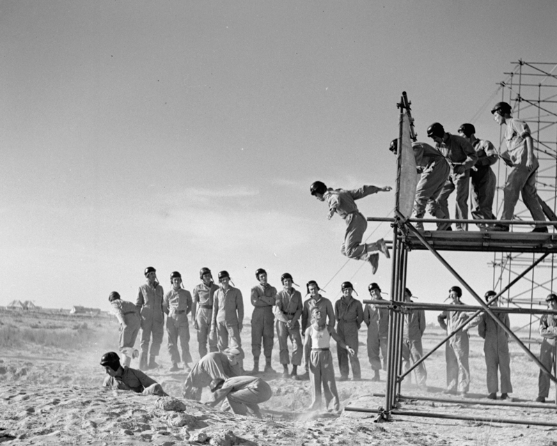 SAS volunteers jumping from steel gantries while undergoing parachute training, c1942