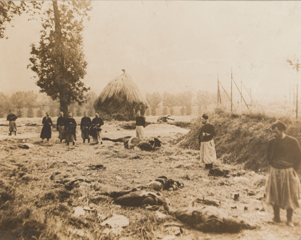 French Zouaves bury German dead at Chemin, 1914