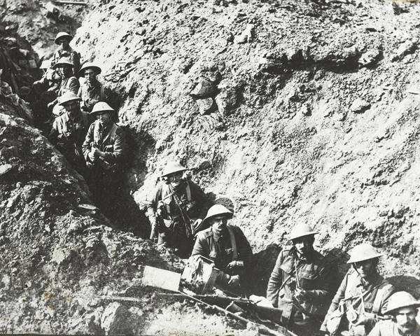 Soldiers from 2nd Battalion The Auckland Regiment wait in a trench near Flers, 1916