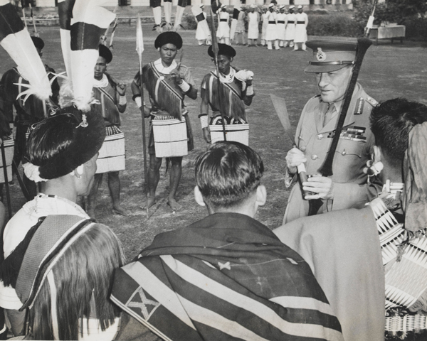 Field Marshal Sir Claude Auchinleck with Naga troops in their traditional ceremonial dress, 1946 