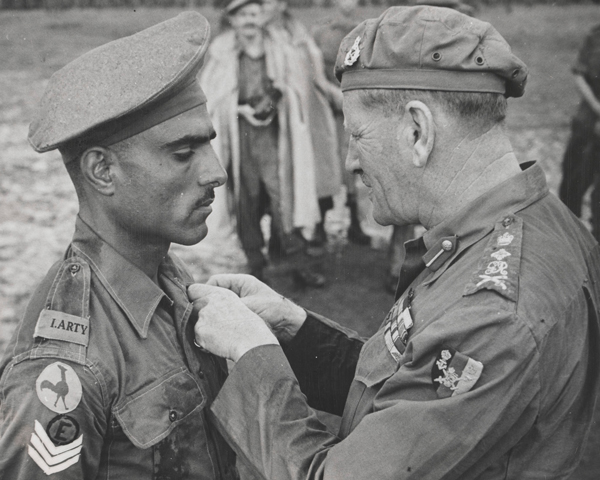 Havildar Mohan Lal receiving the Indian Distinguished Service Medal from General Sir Claude Auchinleck, 1944 