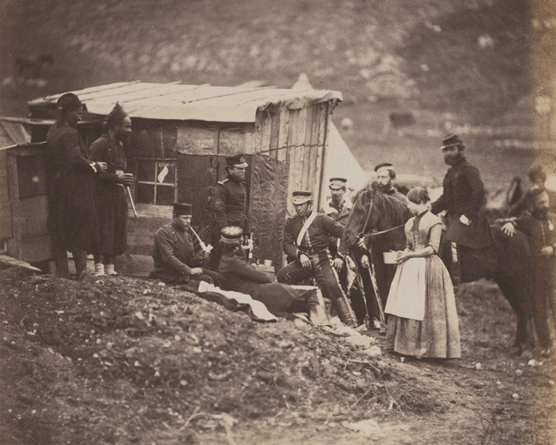 Mrs Rodgers (standing on the right) with soldiers of the 4th Dragoon Guards in the Crimea, 1855. 