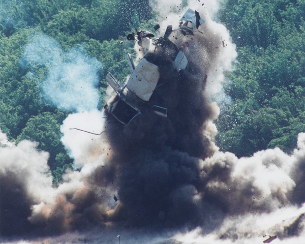 Destruction by RLC ordnance disposal of a car used to transport weapons and explosives, Kosovo, 1999