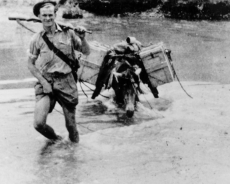 A member of the 2nd King's Own Yorkshire Light Infantry crossing a river, Burma, c1942