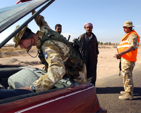 A weapons search at a vehicle checkpoint, 2003