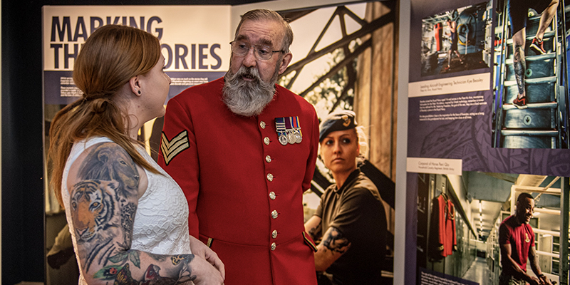 Chelsea Pensioner visiting the Tribute Ink exhibition