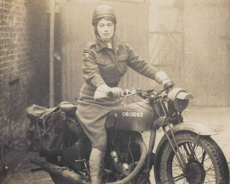 Valerie in ATS uniform on a motorbike, c1944