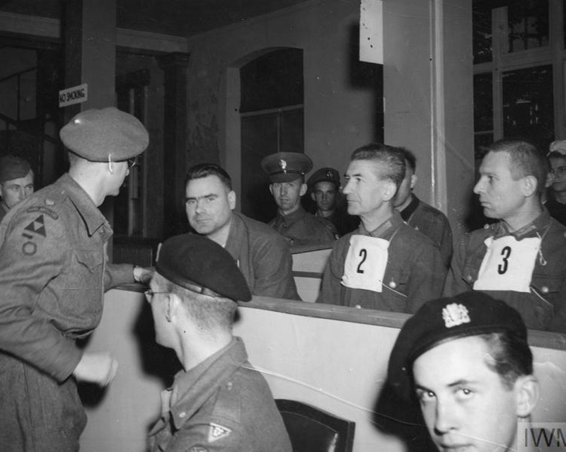 Major T. C. M. Winwood, Commandant Josef Kramer's defence council, speaking to him at the trial, 19 September 1945