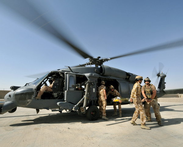 A casualty arrives at Lashkar Gah medical centre by Black Hawk helicopter, 2009