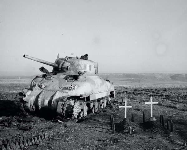 Sherman tank, with graves of crew members, Italy, c1943 