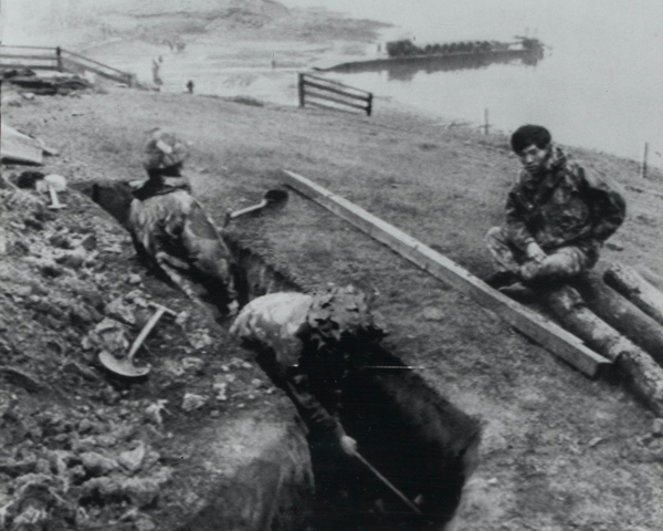 Gurkhas digging a defensive position on the shore of San Carlos Bay, 1982