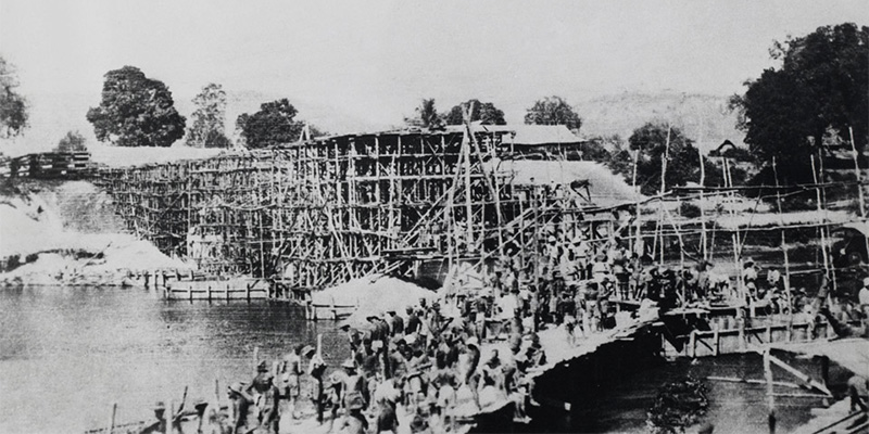 The building of the bridge over the River Kwai taken by a prisoner of war, c1943