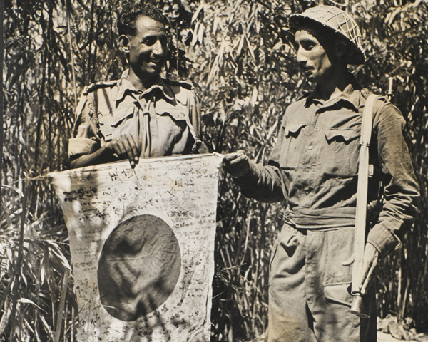 Punjab Regiment troops with a captured Japanese flag, Arakan, c1945