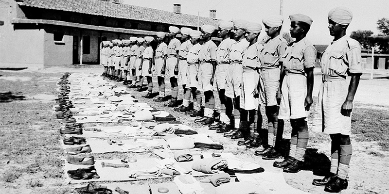 Recruits of 17th Dogra Regiment await kit inspection, Jullunder, India, c1944
