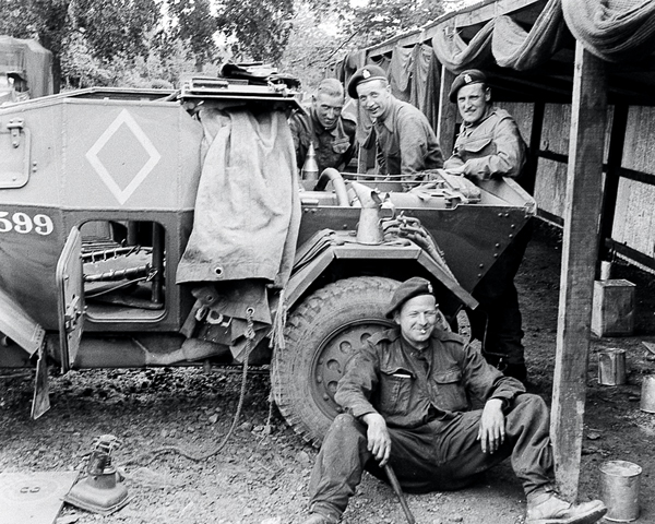 ‘At work on a scout car’, 3rd County of London Yeomanry (Sharpshooters), Westbury, 1941