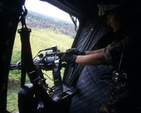 A CH47 Chinnock Minigunner in action during Operation Barras, 2000