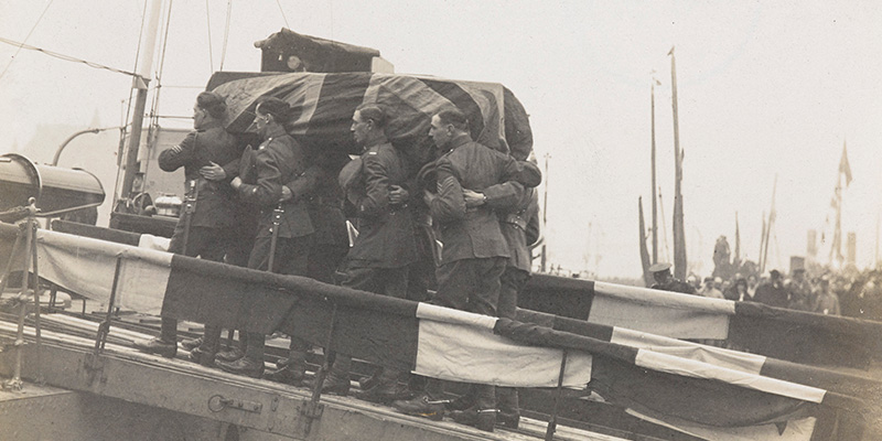 The coffin of the ‘Unknown Warrior’ being carried on to the Royal Navy destroyer HMS ‘Verdun’, Boulogne, 10 November 1920
