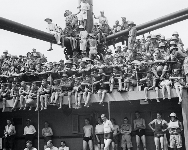 Troops watching a 'Crossing the Line' ceremony on HMT 'Orion', 1941
