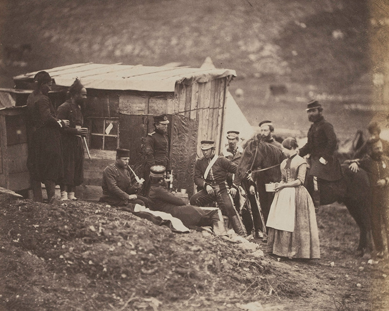 Mrs Rogers, wife of a non-commissioned officer, with other soldiers on campaign in the Crimea, 1855