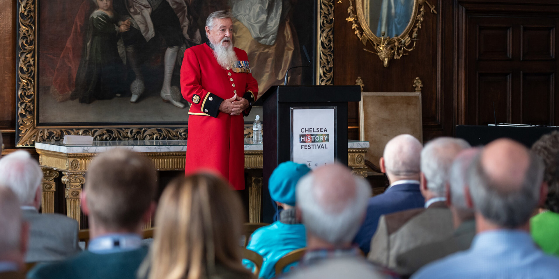 A Chelsea Pensioner giving a talk at the Royal Hospital