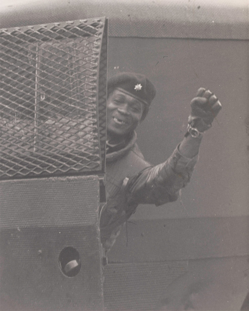 Ethan Fagon leaning out of a military vehicle, Northern Ireland, c1970-83