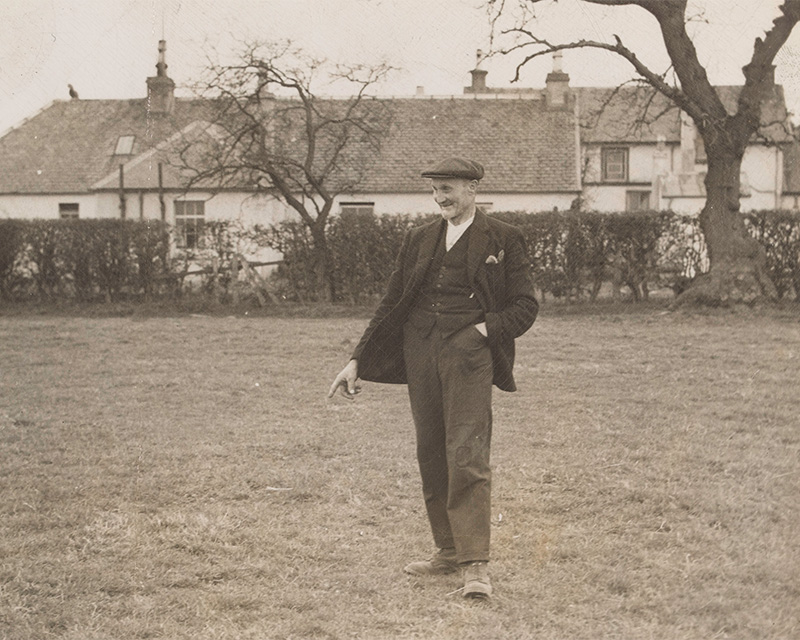 David McLean outside the cottage where Rudolf Hess crash landed, 1941