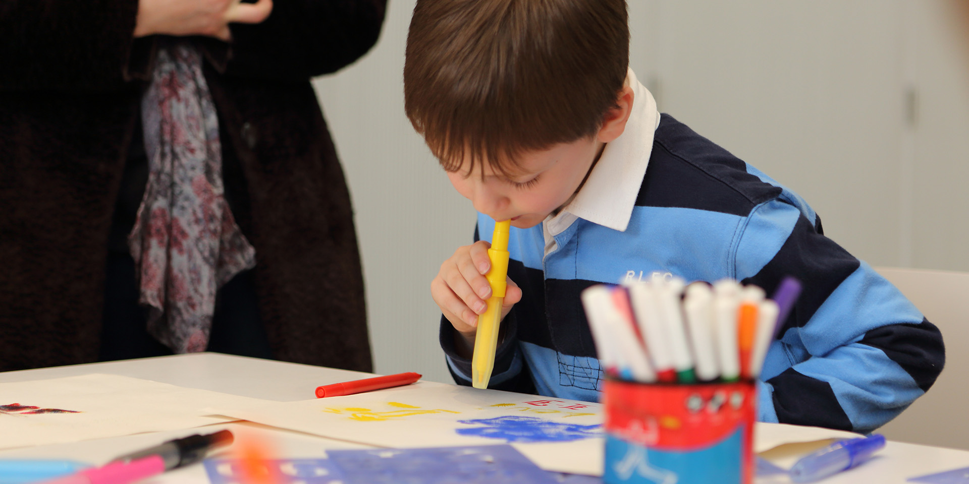 A child taking part in an art workshop at the National Army Museum