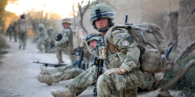 Private Laura Docherty, Royal Army Medical Corps, on patrol with the Royal Irish Regiment in Helmand, 2010