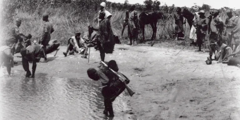 British troops from Cameroon refresh themselves at a river, 1918 
