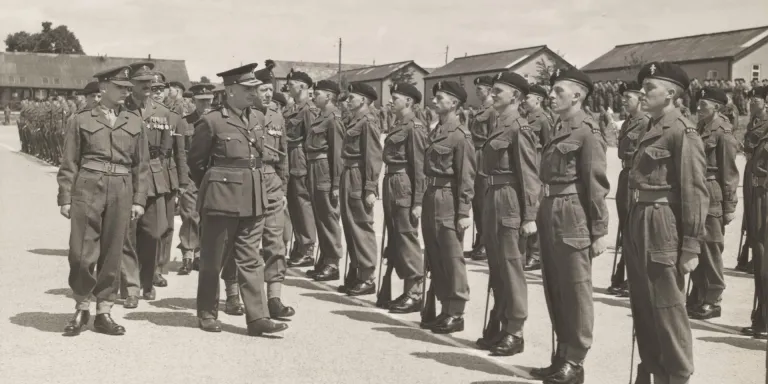 Major-General SW Joslin inspecting the passing out parade of ‘C’ Company, Royal Electrical and Mechanical Engineers, Honiton Camp, 1952