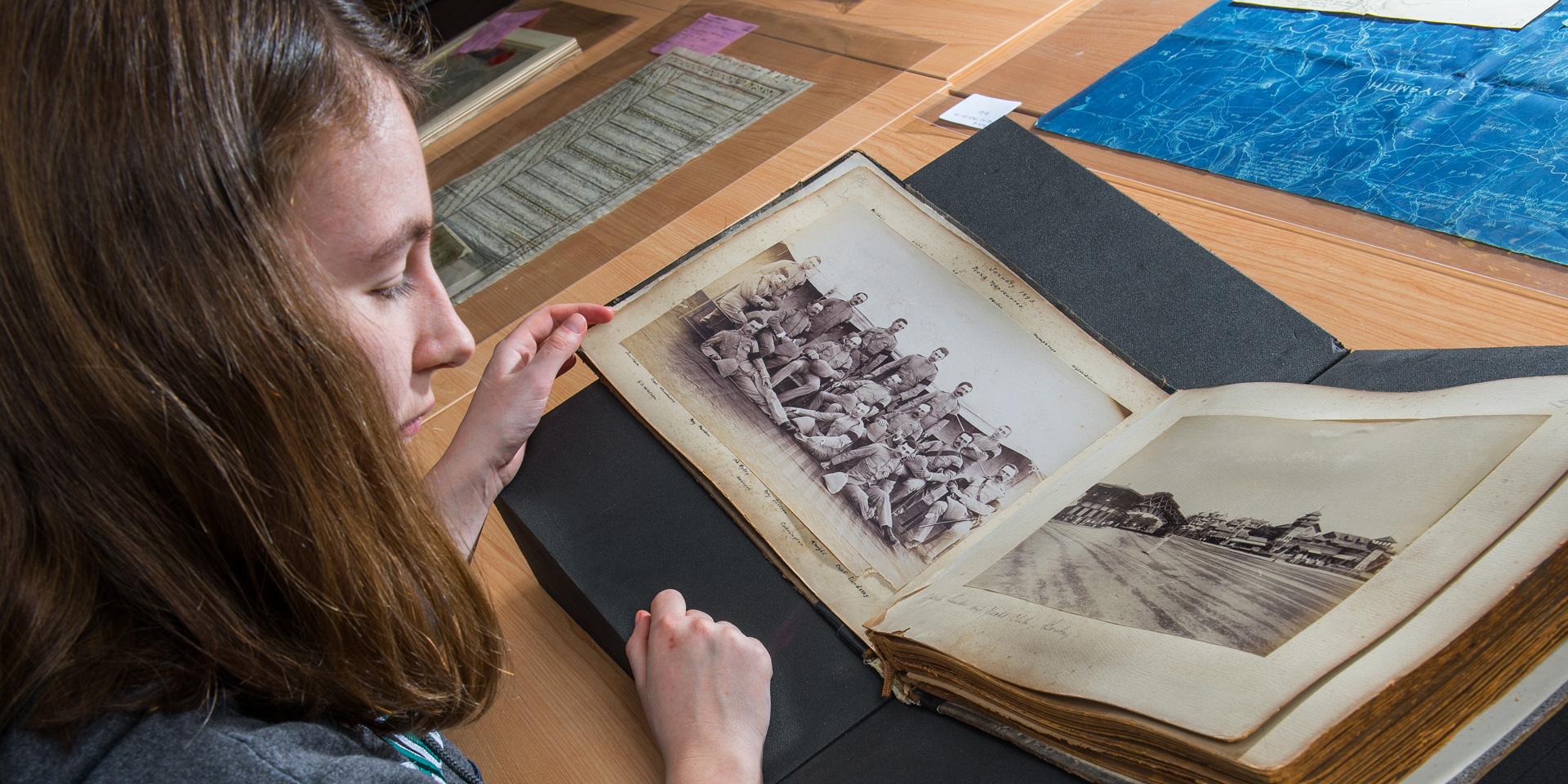 A visitor explores an object from the collection