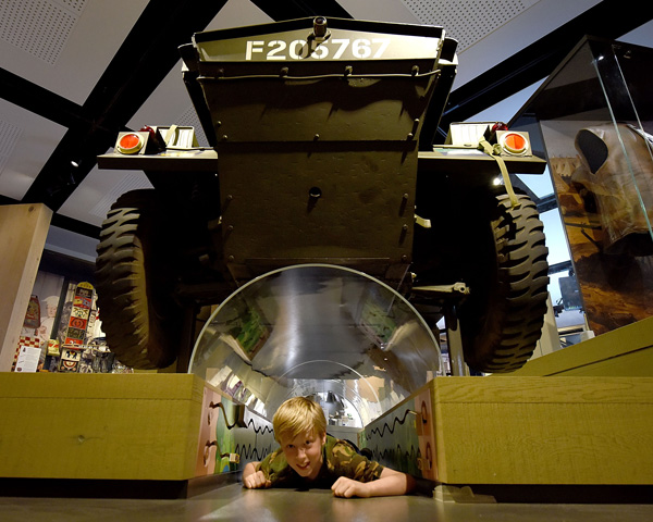 A child crawls through the dingo tunnel