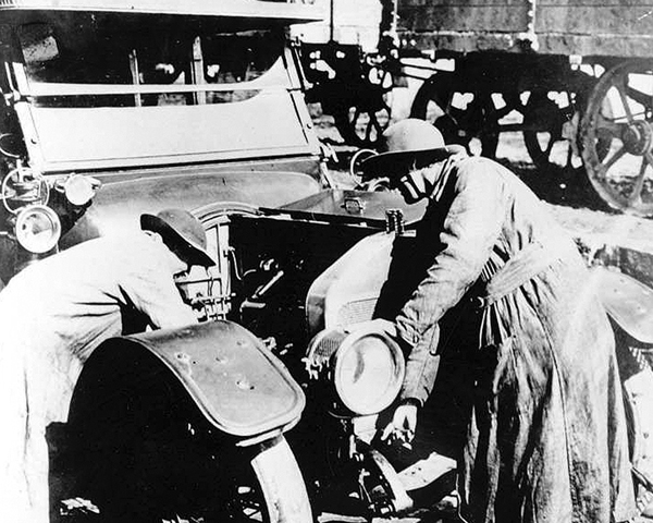 QMAAC mechanics repair a car, 1918