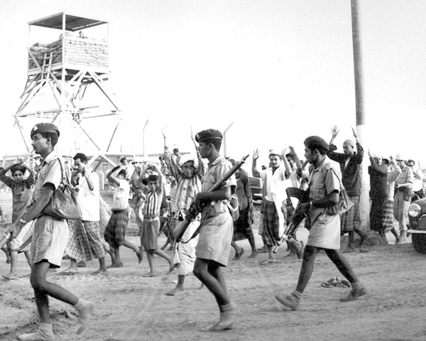 Federation Regular Army soldiers escorting prisoners, 1966