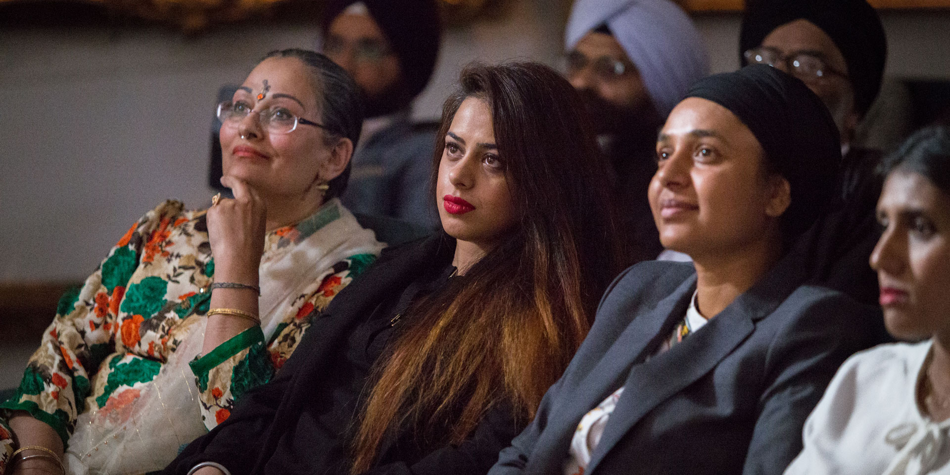 Members of an audience at a talk