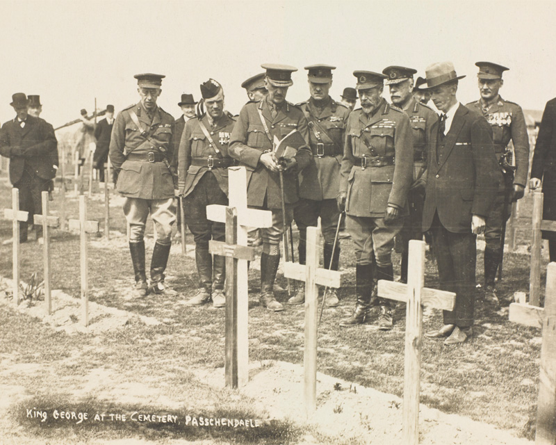 King George V inspects the graves of those killed during the Battle of Passchendaele in the cemetery at Tyne Cot during his visit to the battlefields of France and Belgium in 1922